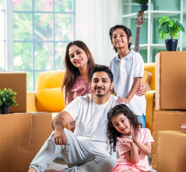 House,Move,Concept.,Happy,Indian,Young,Family,Sitting,On,The